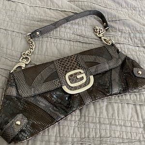 GUESS snake clutch